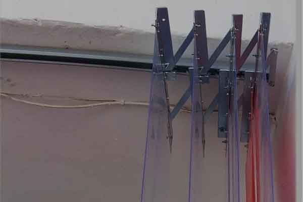 Système de rideaux à lanières en PVC accordéon